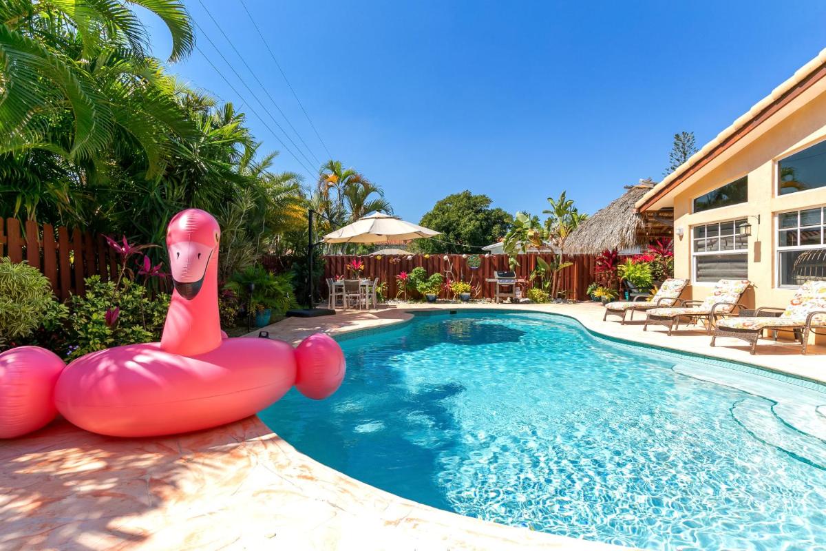 Spaces Sunny Oasis 4BR Retreat with 2 King Beds, Amazing Pool, near South Florida Beaches - Housity