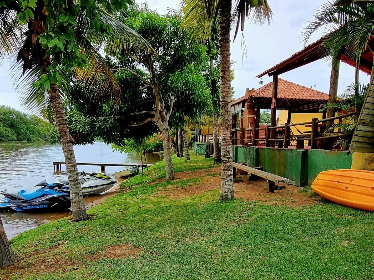 CASA AMARELA Beira Rio Guriri - Housity