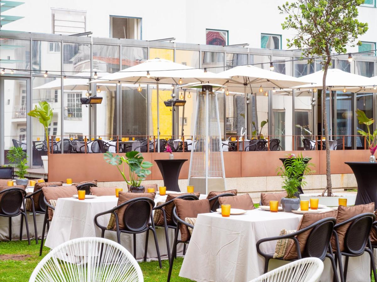 Um restaurante ou outro lugar para comer em InterContinental Porto - Palacio das Cardosas by IHG