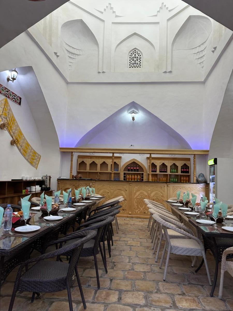 Feruzkhan Hotel - Madrassah Mohammed Rakhim Khan 1871 - Housity