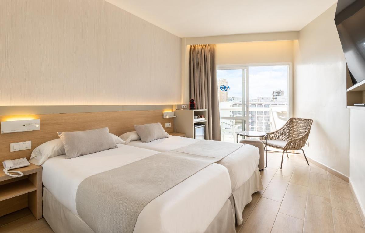 Cama o camas de una habitación en Hotel Samos