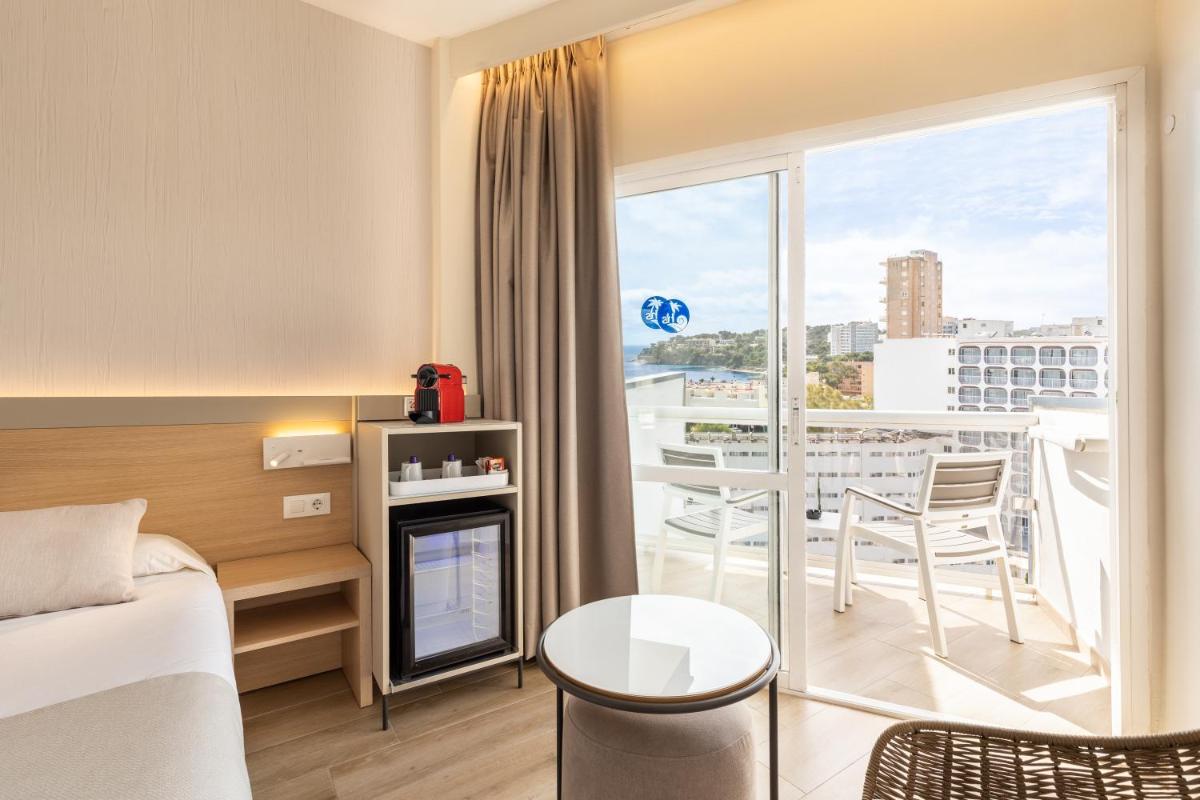 Cama o camas de una habitación en Hotel Samos