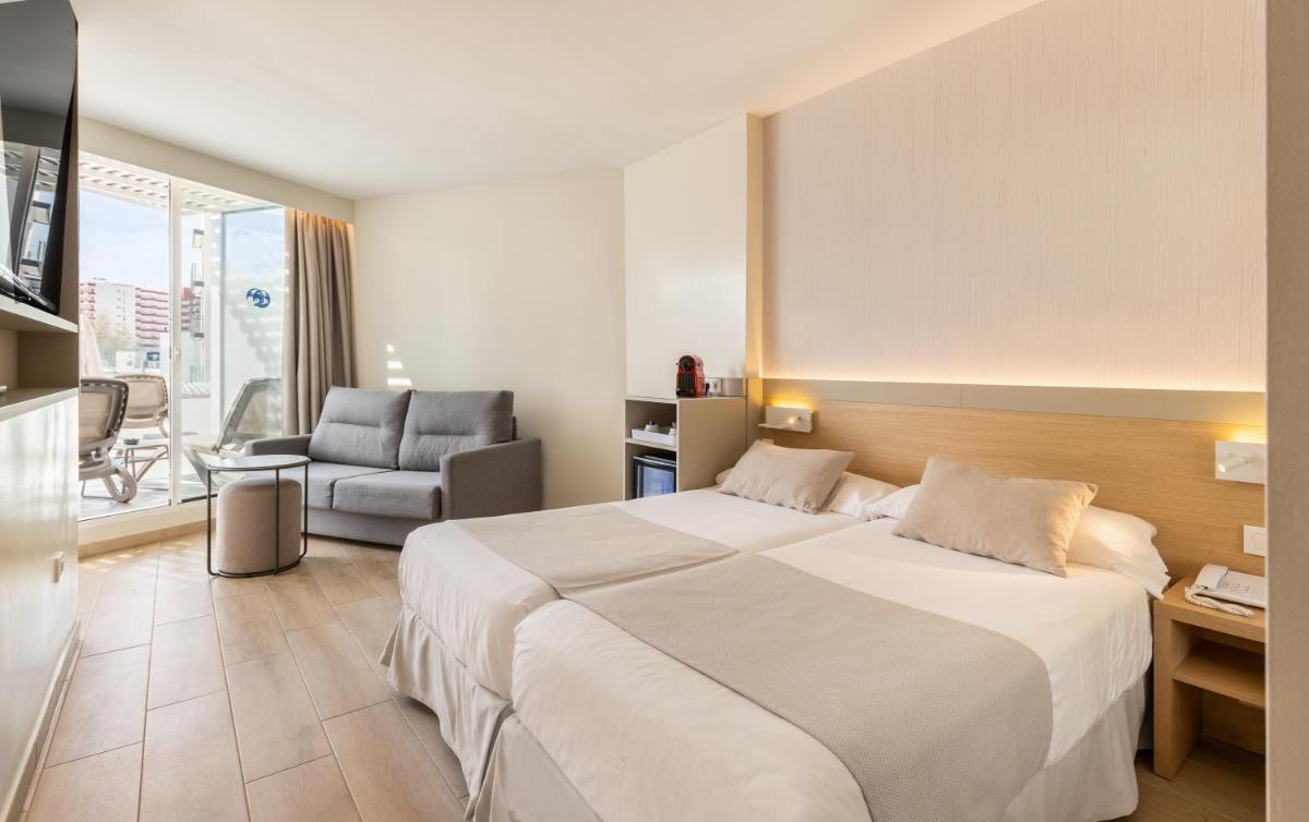 Cama o camas de una habitación en Hotel Samos