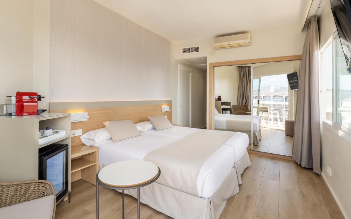 Cama o camas de una habitación en Hotel Samos