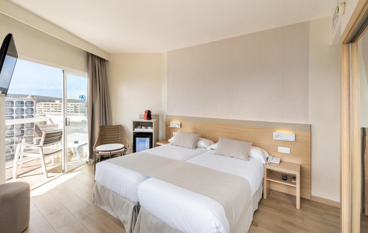 Cama o camas de una habitación en Hotel Samos