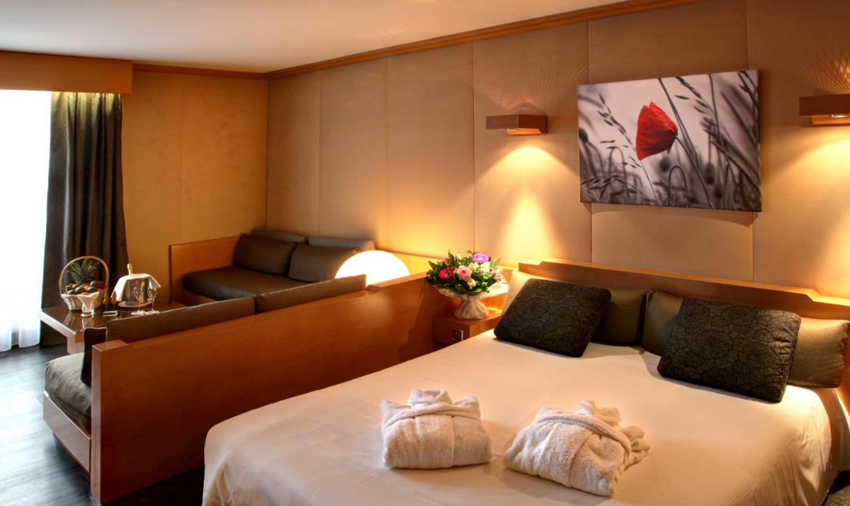 Un ou plusieurs lits dans un hébergement de l'établissement Amirauté Hôtel Golf Deauville