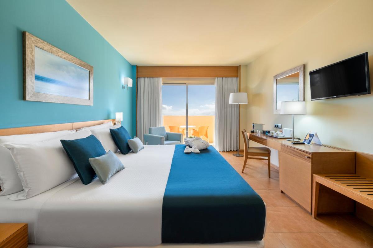 Cama o camas de una habitación en Elba Carlota Beach & Golf Resort