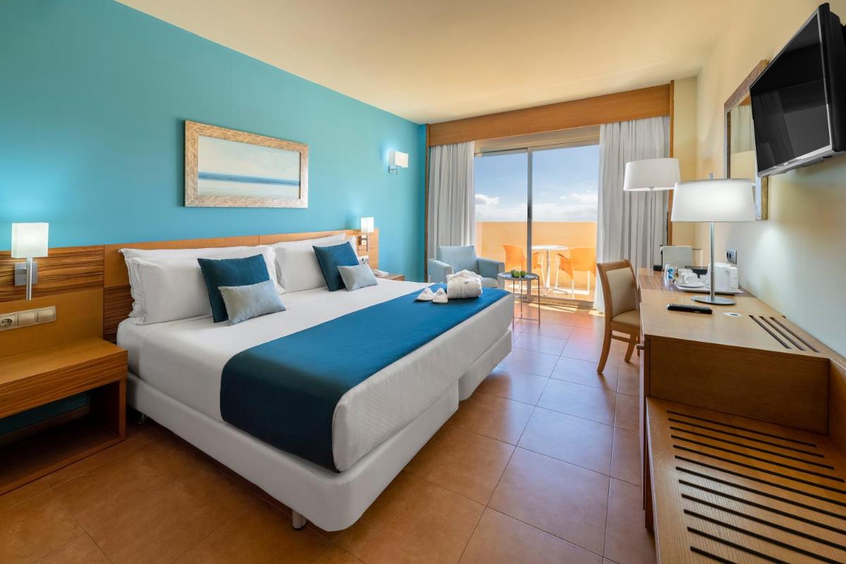 Cama o camas de una habitación en Elba Carlota Beach & Golf Resort