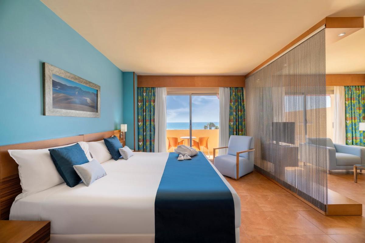 Cama o camas de una habitación en Elba Carlota Beach & Golf Resort