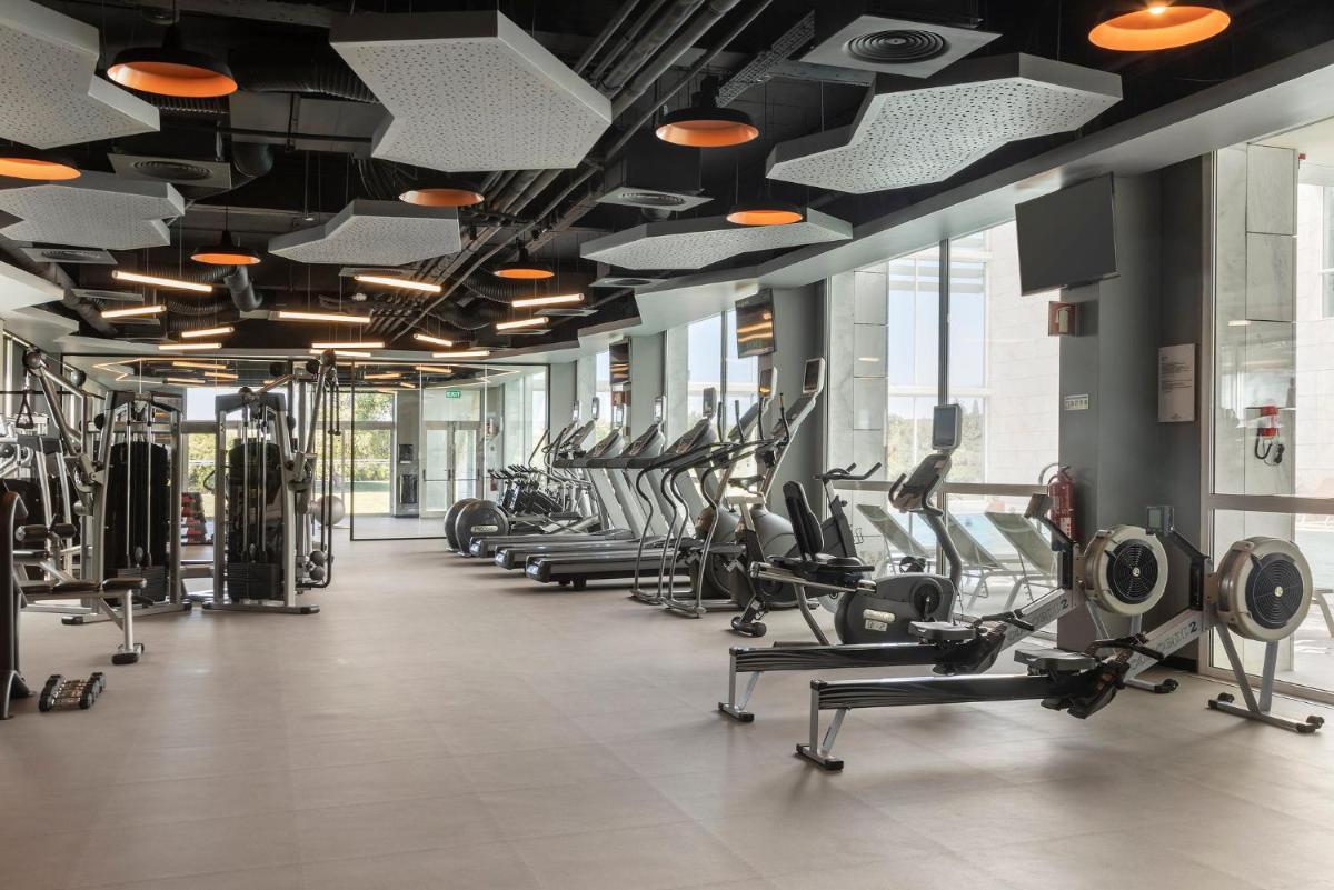 O centro de fitness e/ou as comodidades de fitness de Crowne Plaza - Caparica Lisbon