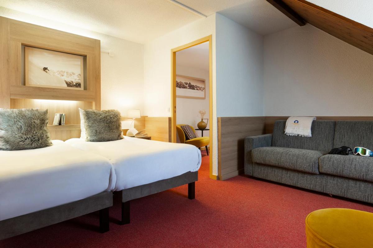 Un ou plusieurs lits dans un hébergement de l'établissement SOWELL HOTELS Mont Blanc et SPA