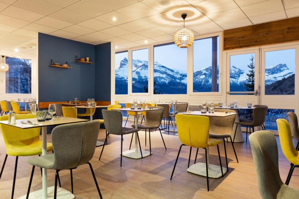 Coin salon dans l'établissement SOWELL HOTELS Mont Blanc et SPA