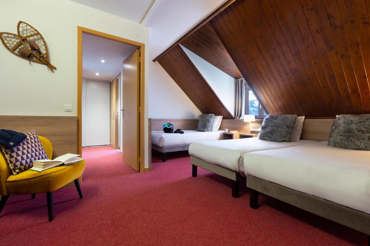 Un ou plusieurs lits dans un hébergement de l'établissement SOWELL HOTELS Mont Blanc et SPA