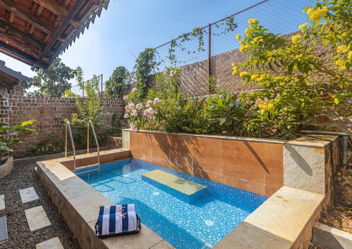 SaffronStays Lake House Dahlia, Nashik - rustic cottages with private plunge pool - Housity