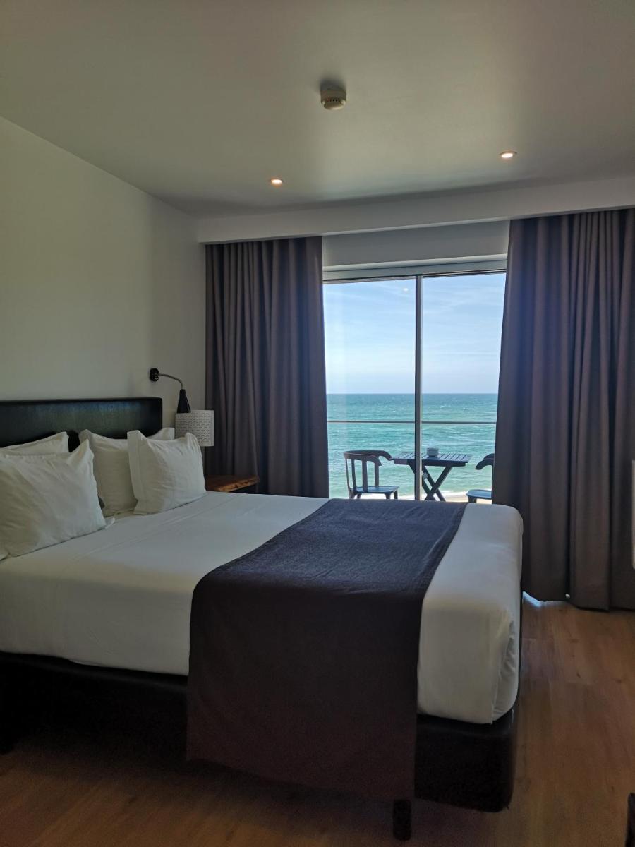 Uma cama ou camas num quarto em Promar - Eco Beach & Spa Hotel
