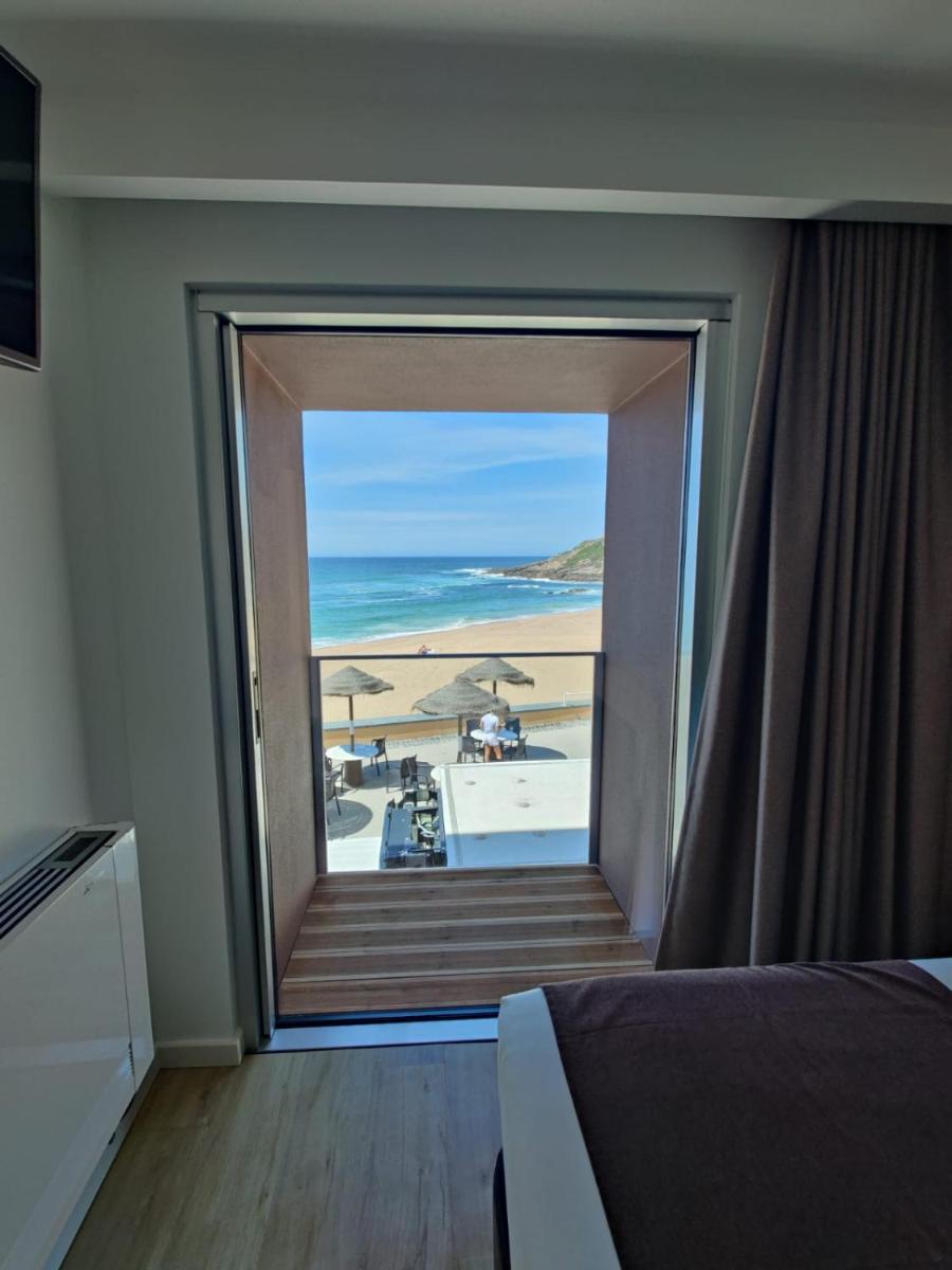 Uma cama ou camas num quarto em Promar - Eco Beach & Spa Hotel