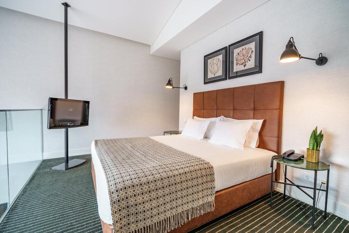 Uma cama ou camas num quarto em Monte Real - Hotel, Termas & Spa