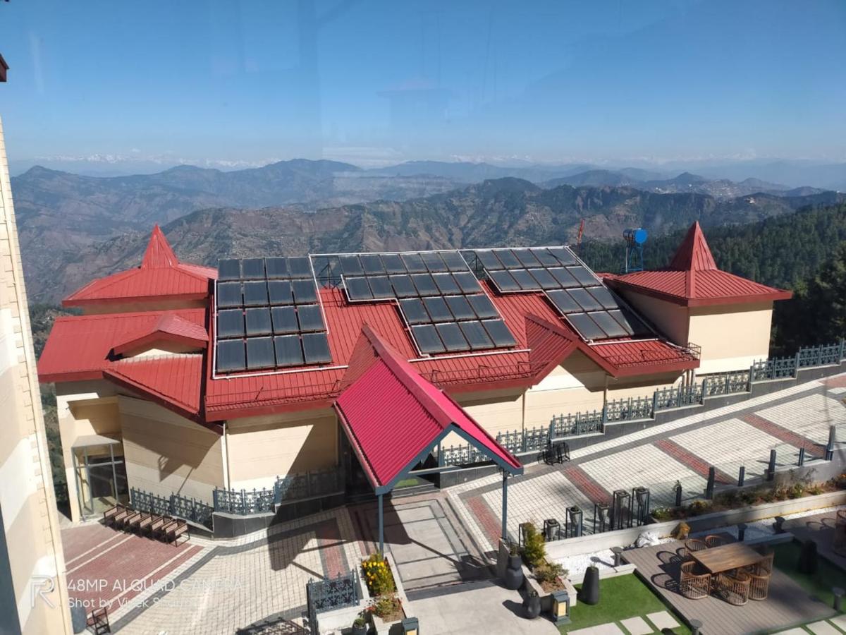 an overhead view of a building with red roofs at Radisson Kufri in Shimla