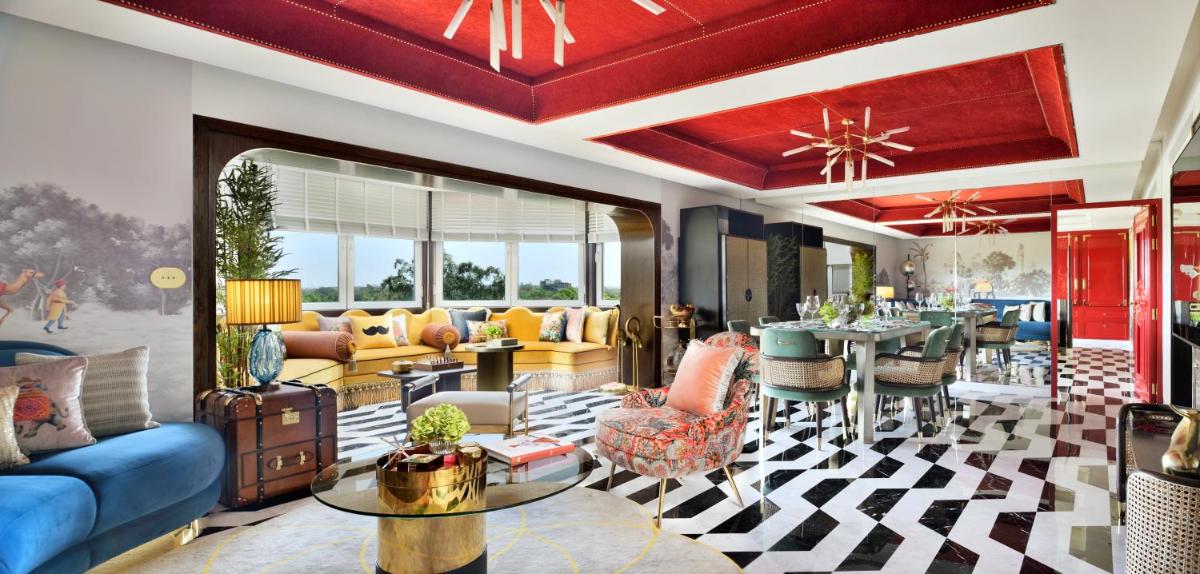 a living room with a couch and a table at Taj Mahal, New Delhi in New Delhi