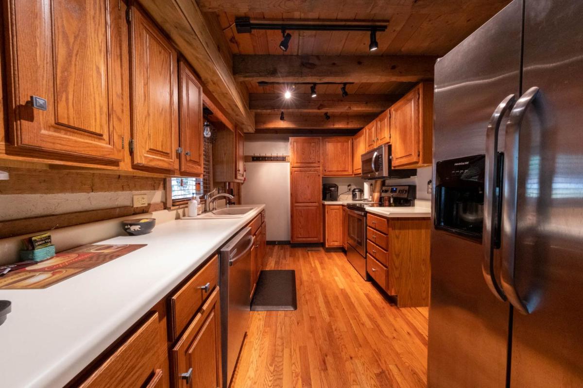 Log Cabin on the River w/Hot Tub - Housity