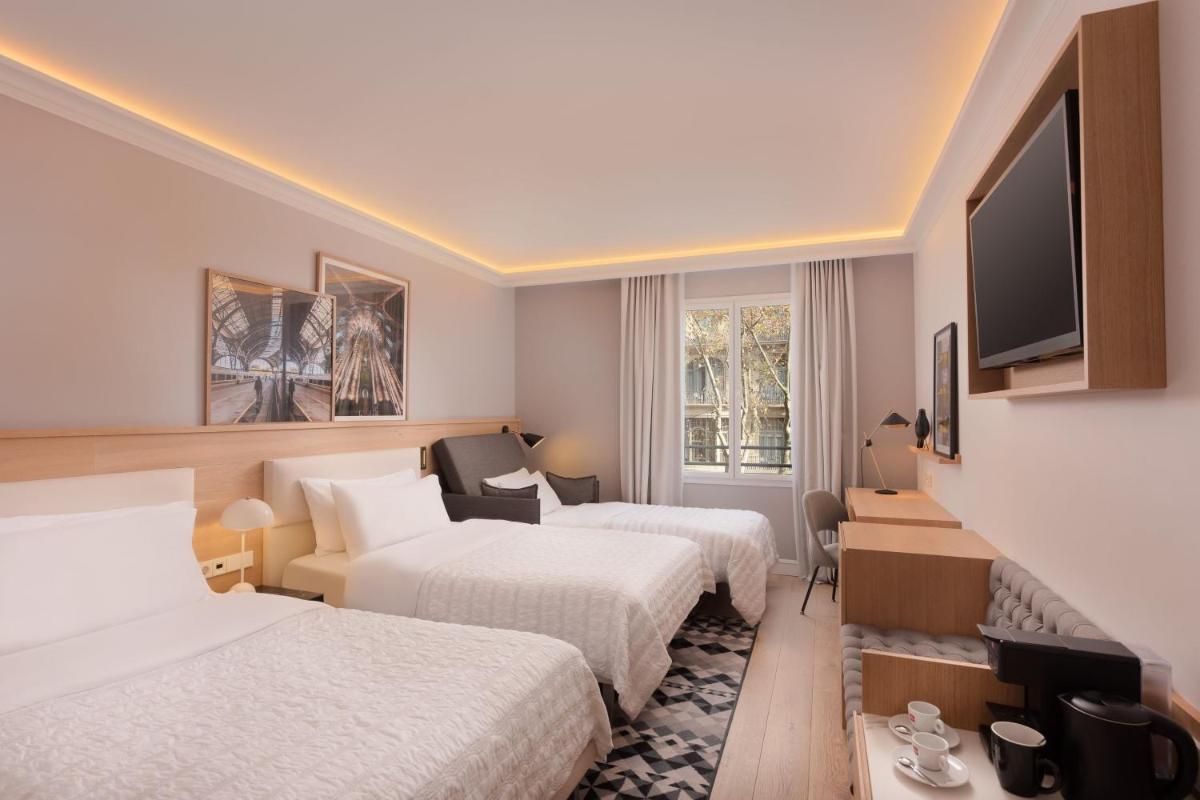 Cama o camas de una habitación en Le Meridien Barcelona