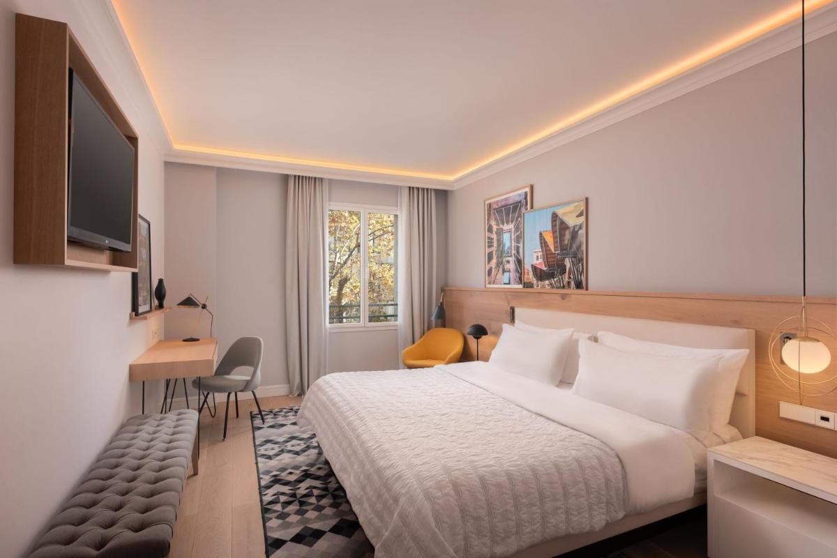Cama o camas de una habitación en Le Meridien Barcelona