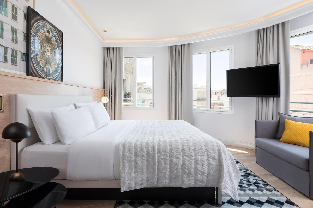 Cama o camas de una habitación en Le Meridien Barcelona