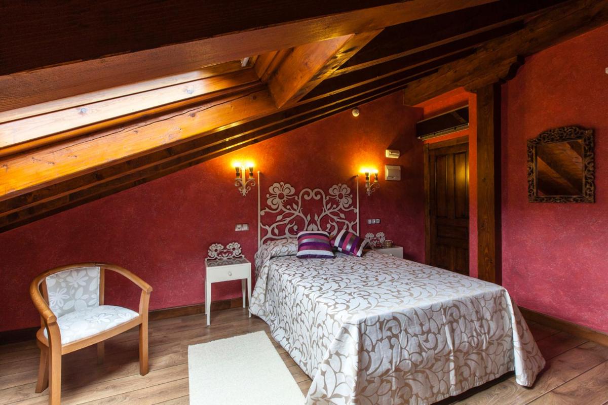 Cama o camas de una habitación en Hotel Spa Casona La Hondonada