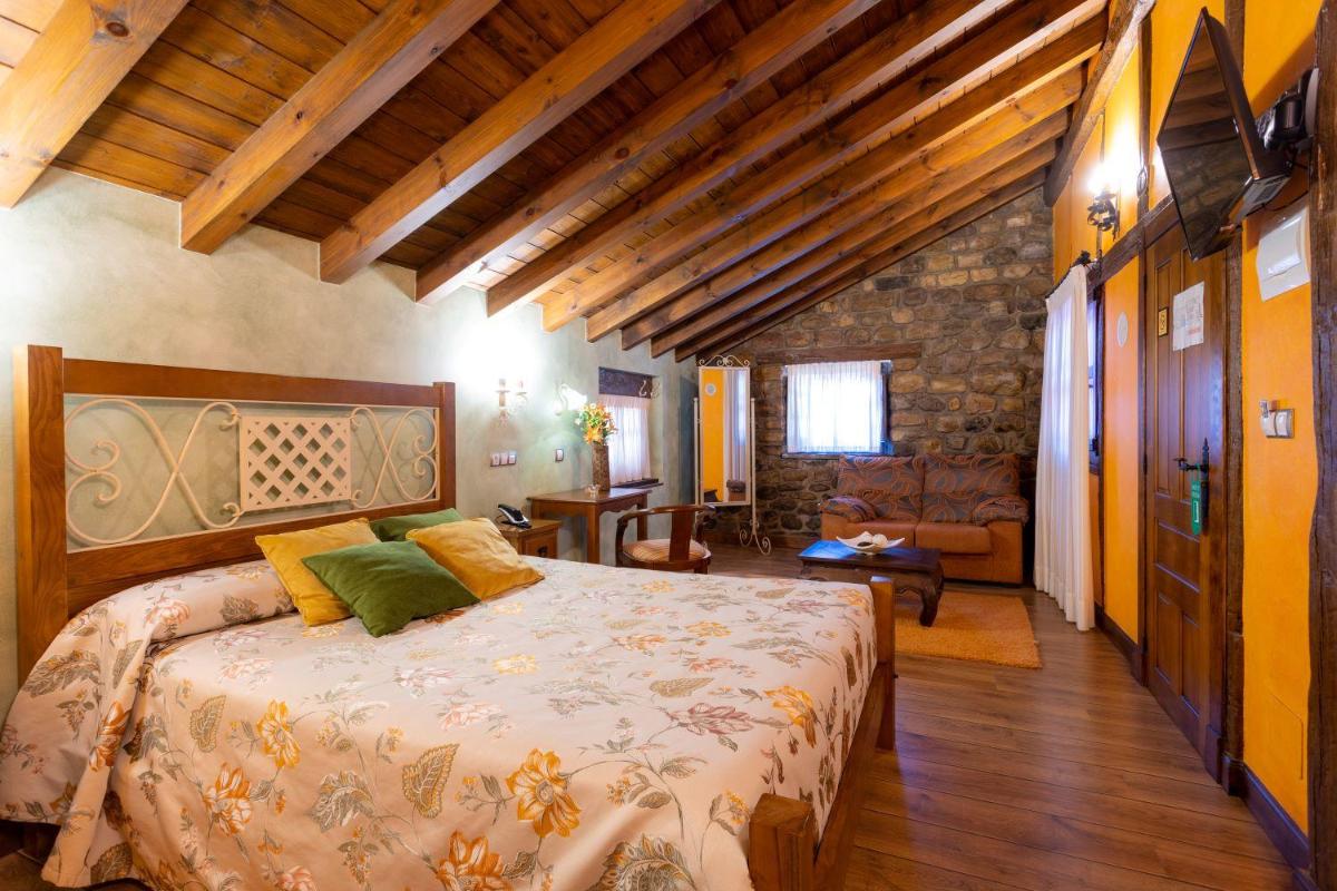 Cama o camas de una habitación en Hotel Spa Casona La Hondonada