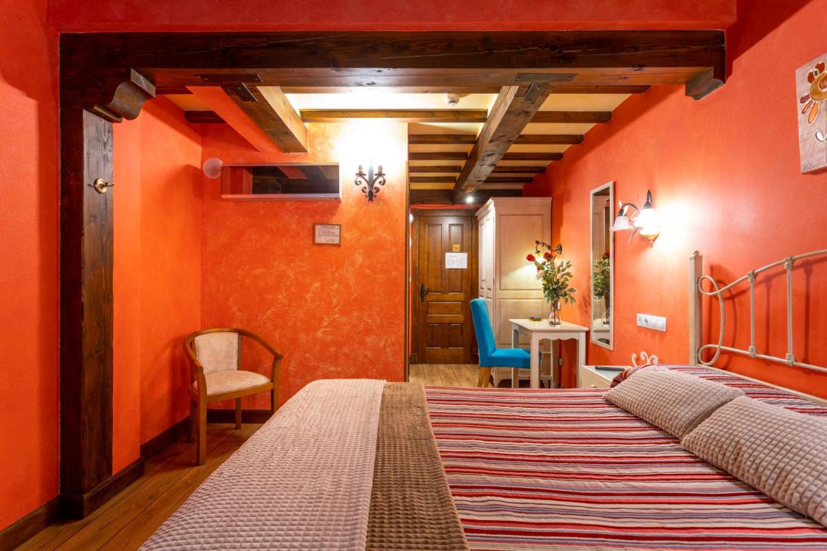 Cama o camas de una habitación en Hotel Spa Casona La Hondonada