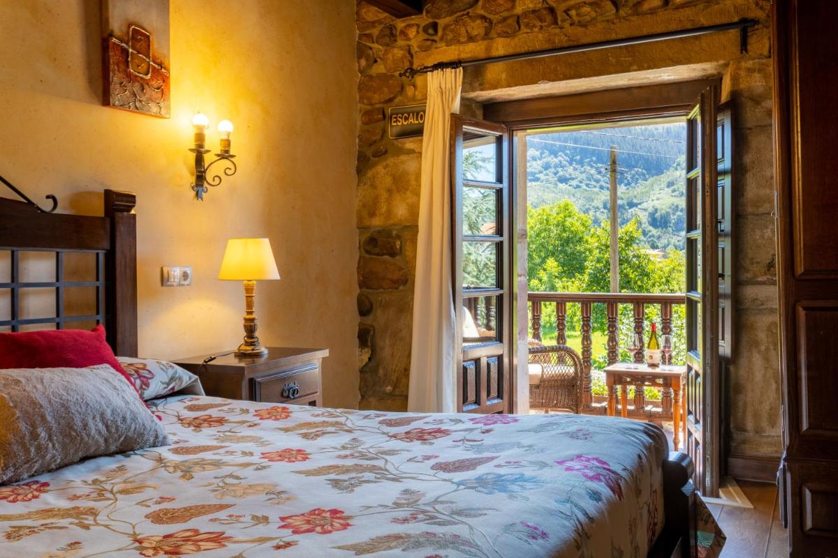 Cama o camas de una habitación en Hotel Spa Casona La Hondonada