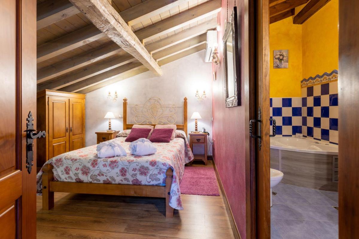 Cama o camas de una habitación en Hotel Spa Casona La Hondonada