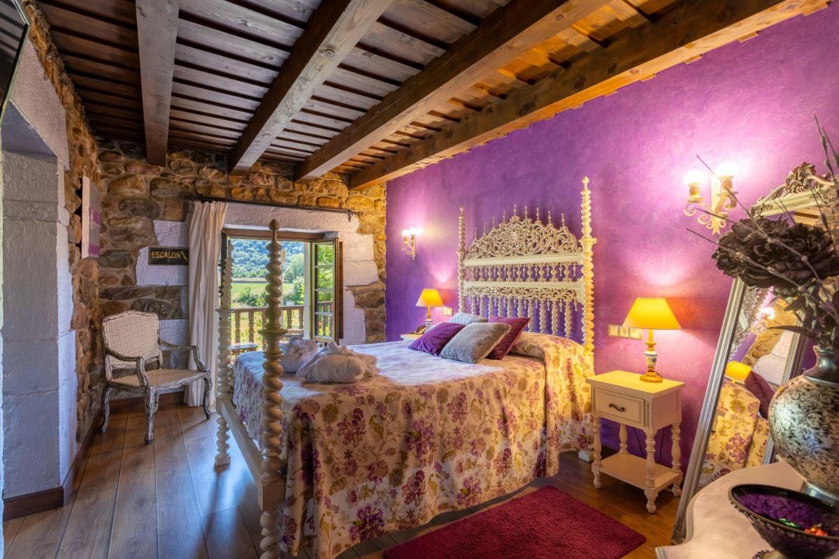 Cama o camas de una habitación en Hotel Spa Casona La Hondonada