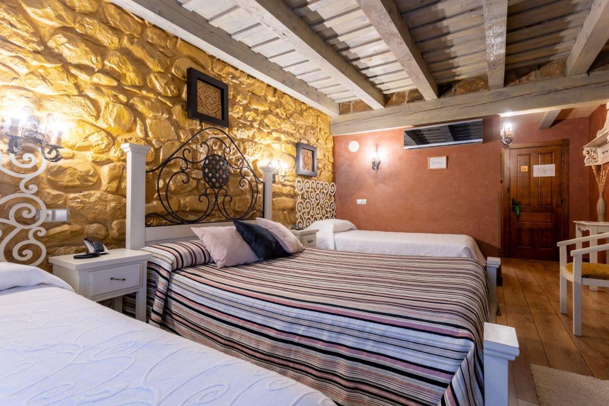 Cama o camas de una habitación en Hotel Spa Casona La Hondonada