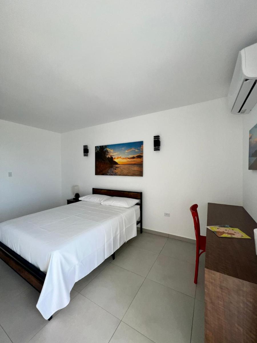 Red Flamboyan Guesthouse and Restaurant - Housity