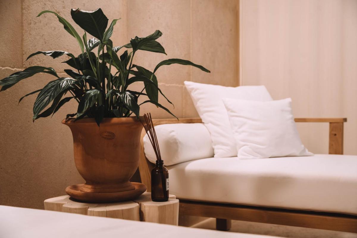 Coin salon dans l'établissement Hôtel Hemen