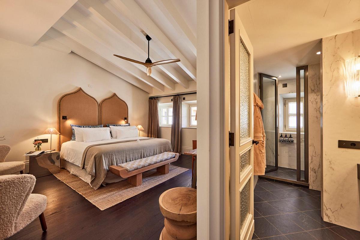 Cama o camas de una habitación en Puro Grand Hotel
