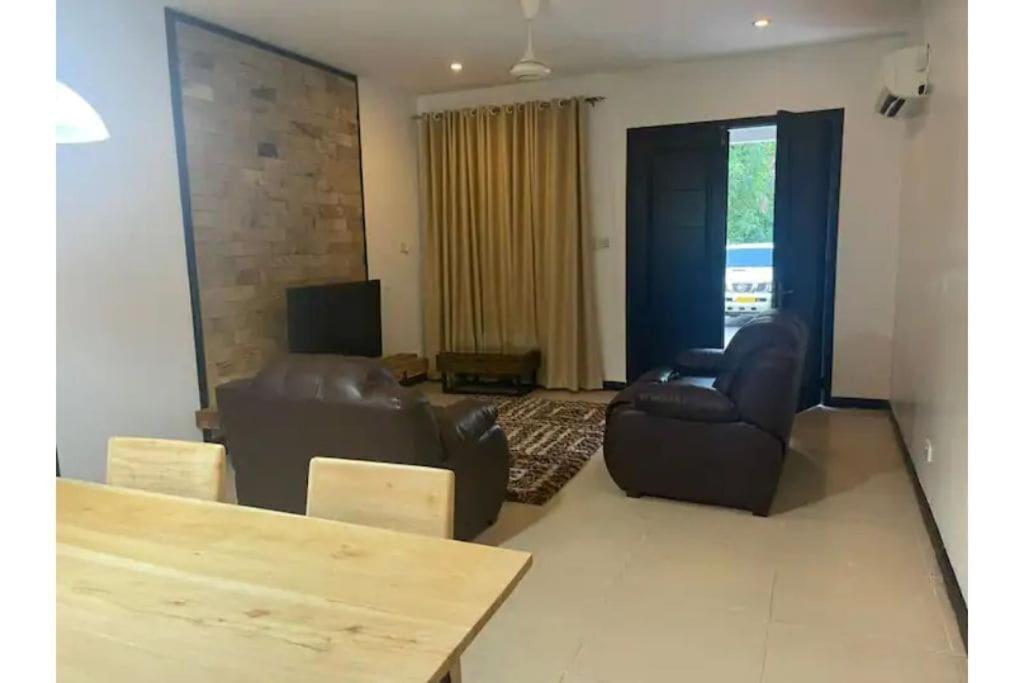 Entire 2 bedroom house with free wifi in Masaki - Housity
