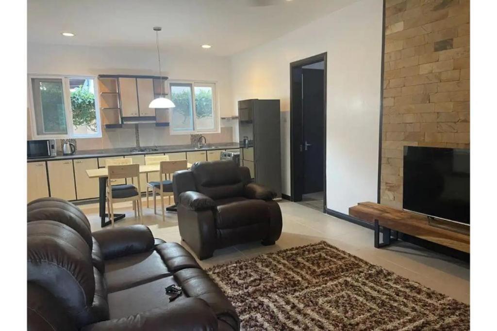 Entire 2 bedroom house with free wifi in Masaki - Housity