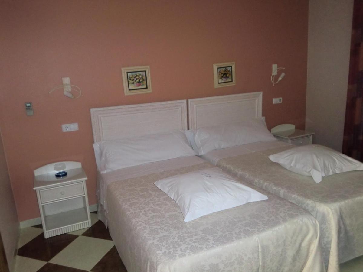 Cama o camas de una habitación en Hotel Gasaqui