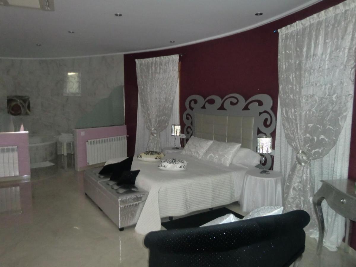 Cama o camas de una habitación en Hotel Gasaqui