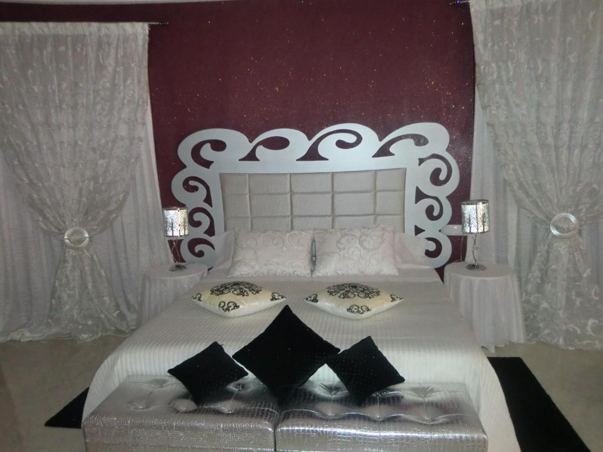 Cama o camas de una habitación en Hotel Gasaqui