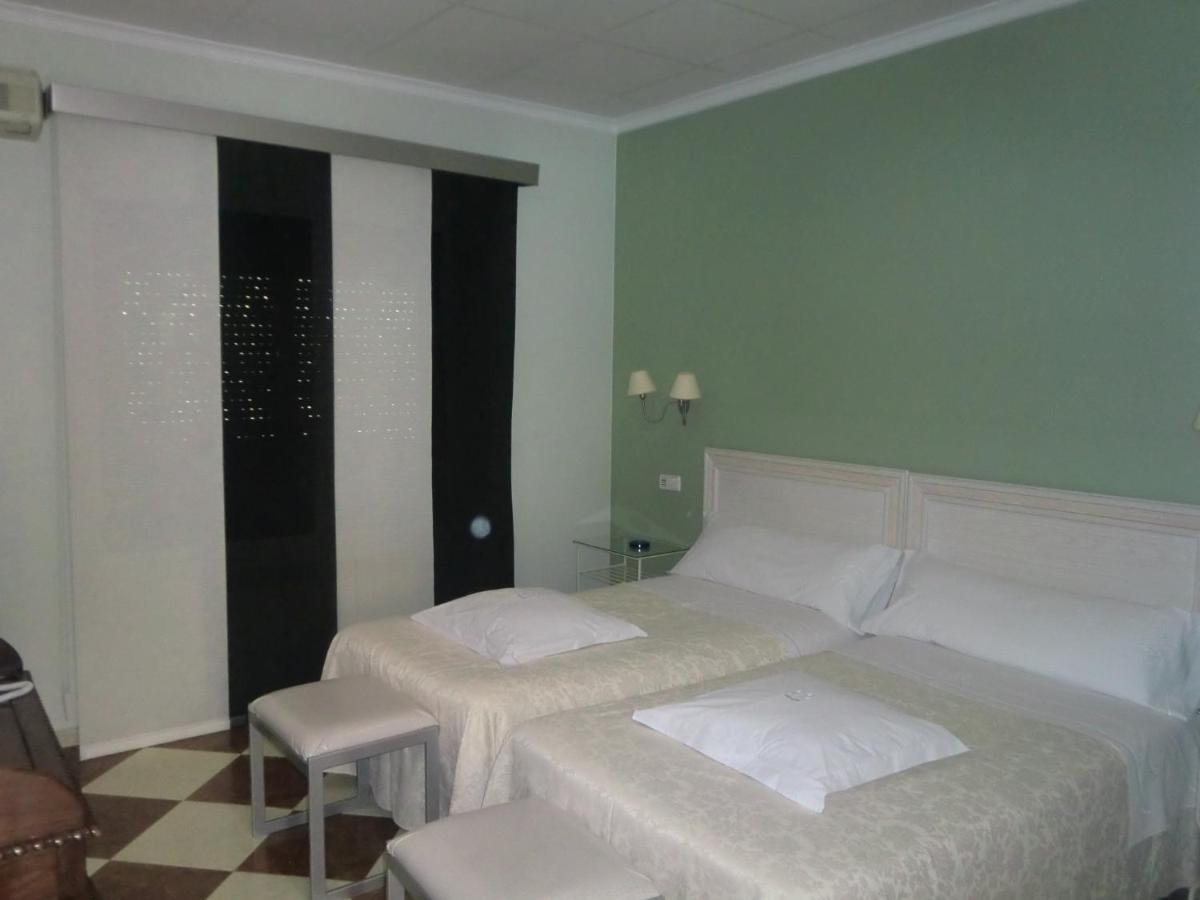 Cama o camas de una habitación en Hotel Gasaqui
