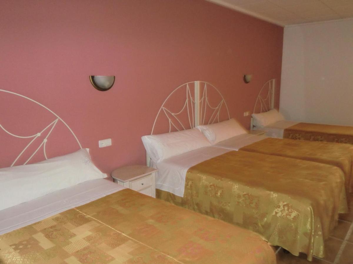 Cama o camas de una habitación en Hotel Gasaqui
