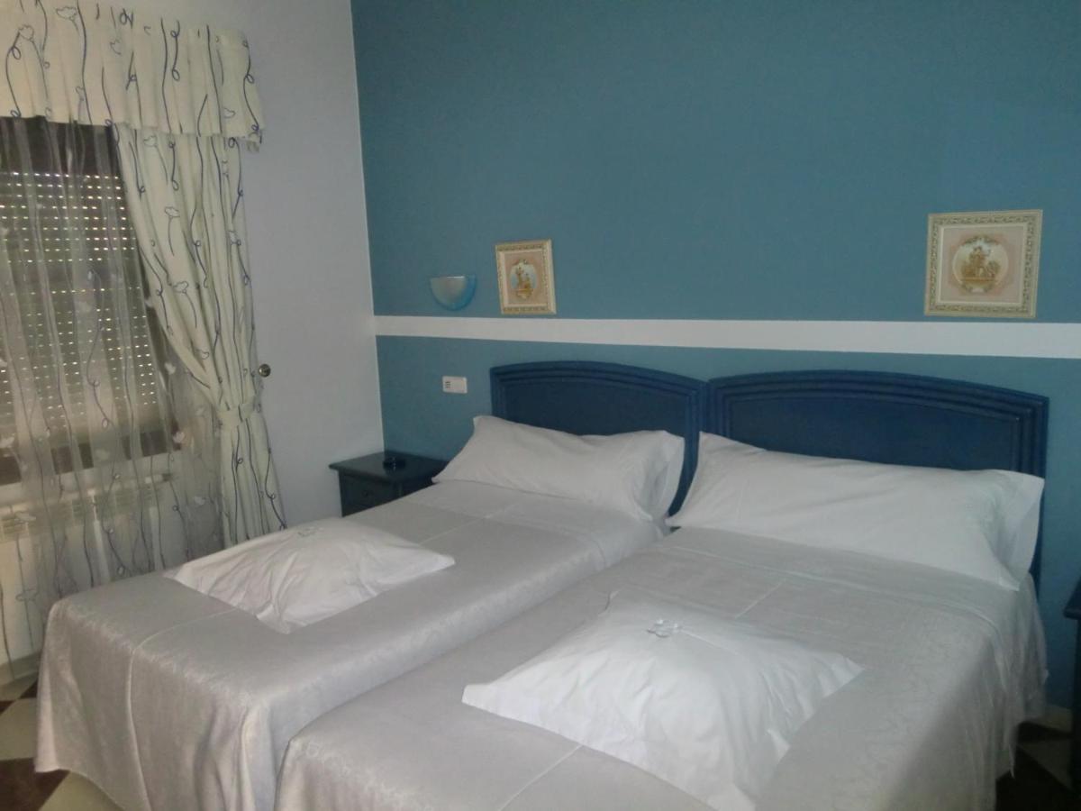Cama o camas de una habitación en Hotel Gasaqui