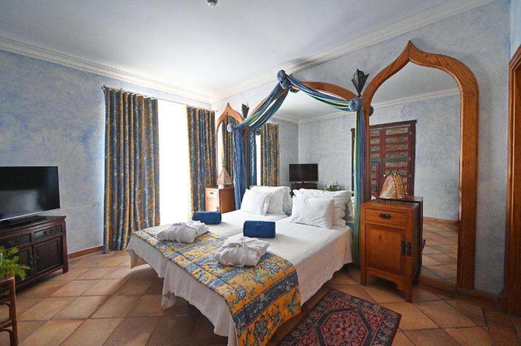 Uma cama ou camas num quarto em Boa Vista Hotel & Spa - Adults Only