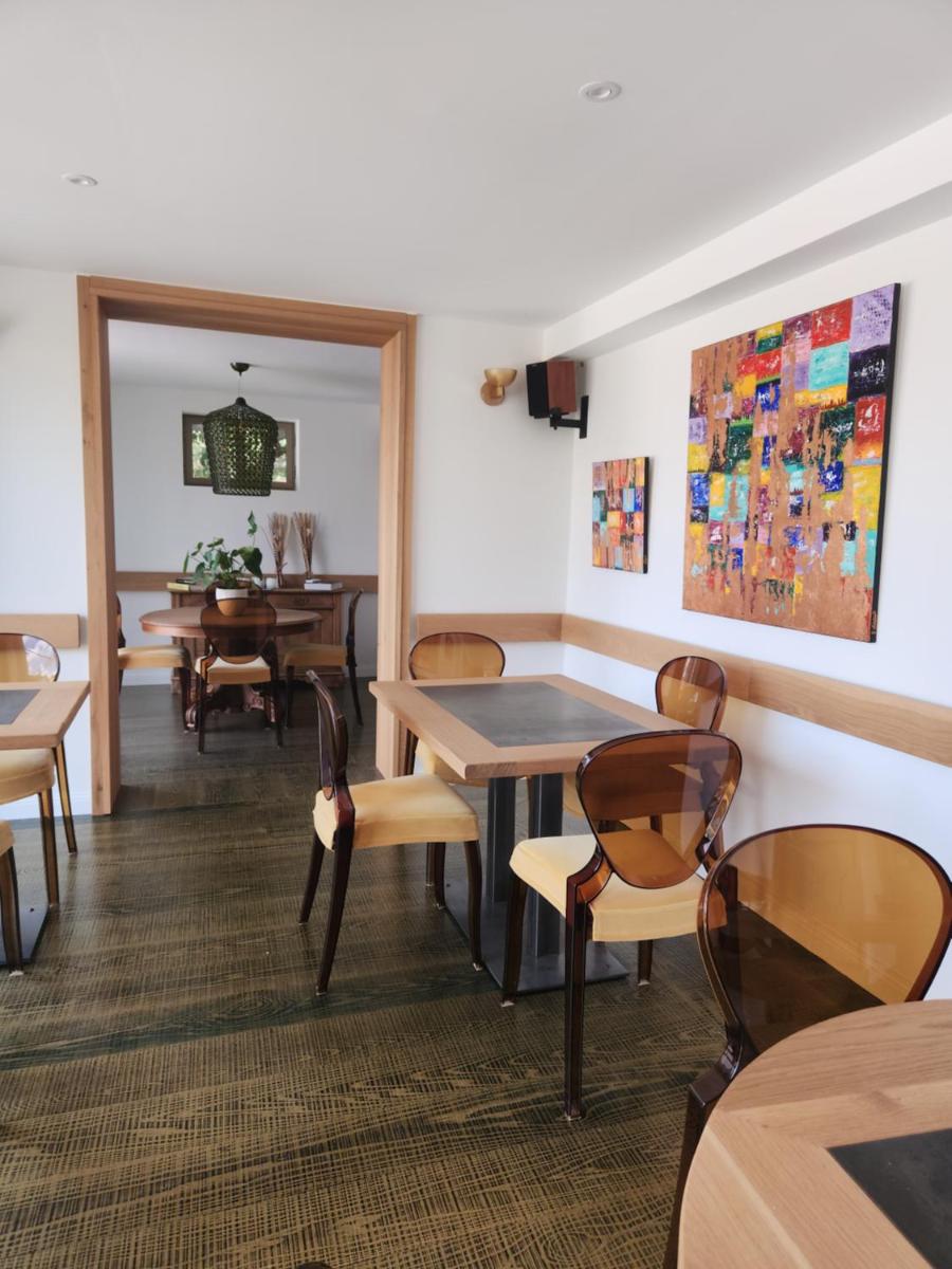 Coin salon dans l'établissement Hôtel Casale Olmia
