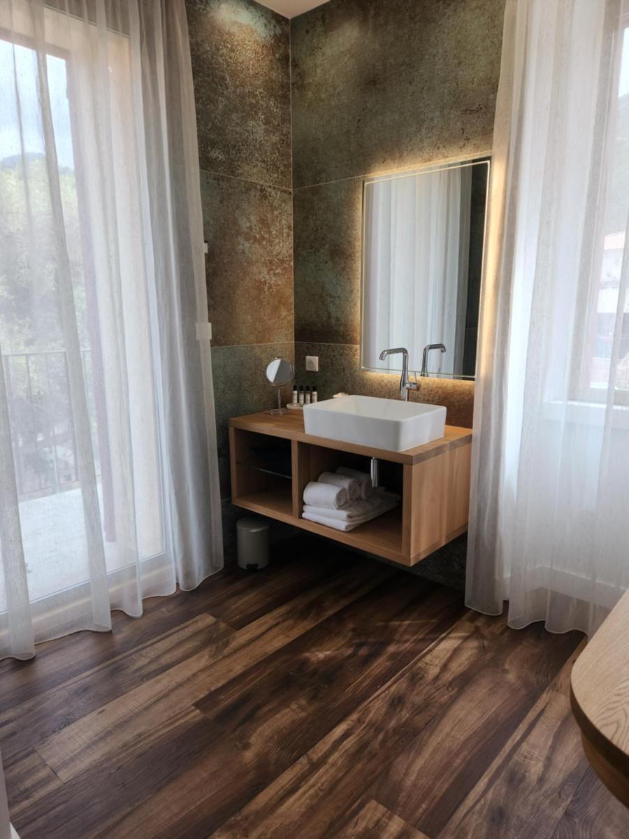 Salle de bains dans l'établissement Hôtel Casale Olmia