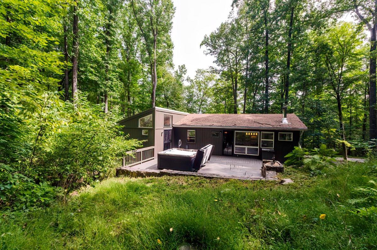 Secluded Oasis w Hot Tub, Screened-in Porch, WiFi! - Housity