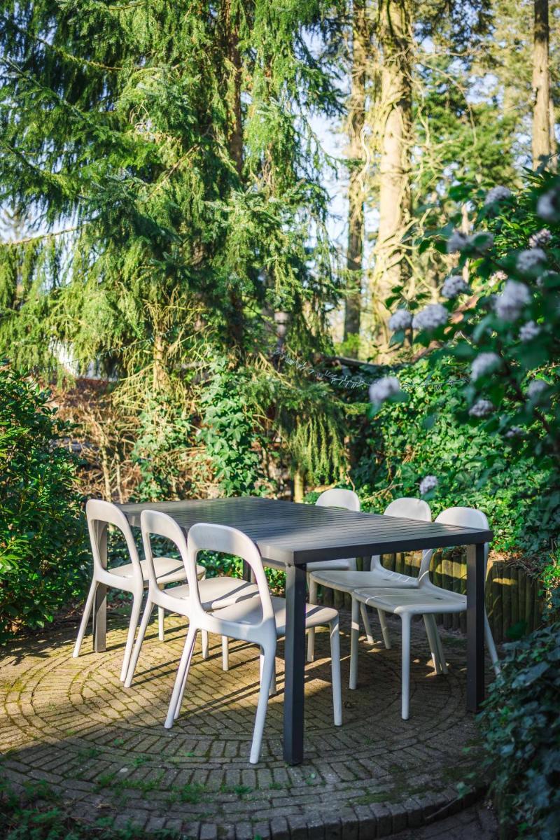 Luxe vakantiehuis in het bos met jacuzzi en sauna - Housity
